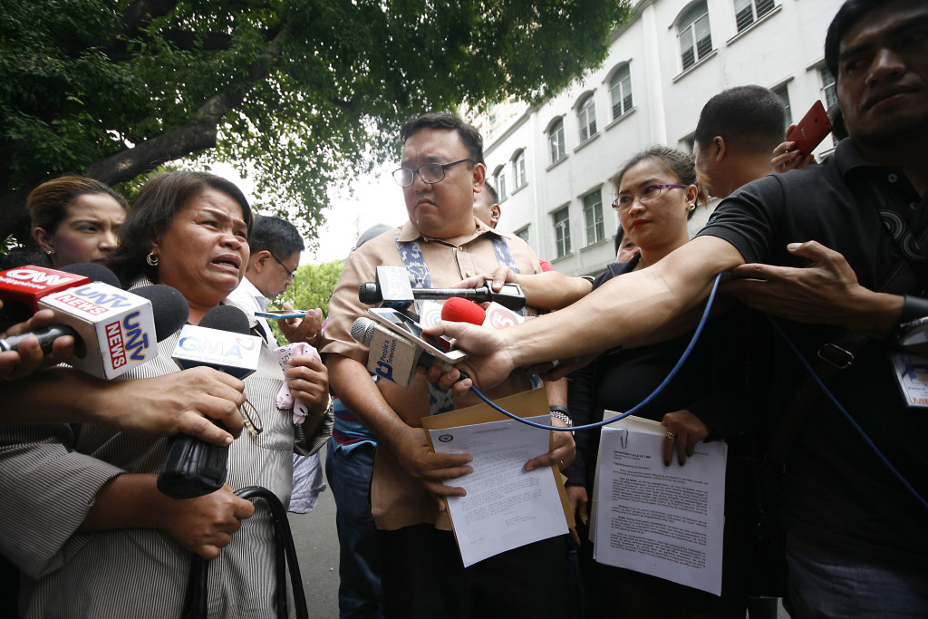 Ms. Julita Laude, mother of Jennifer Laude, with her counsel, Atty. Harry Roque