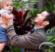 The world's first patient to receive a 3D-printed tibia transplant, Reuben Lichter, with his son, William.