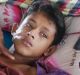 Rohingya man Hossain Ahamed points to the bullet wound his son Mohammad Touha, 16, sustained while fleeing Myanmar, as ...