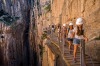 Tourists walk along the 'El Caminito del Rey' (King's Little Path) footpath in Malaga, Spain. 'El Caminito del Rey', ...