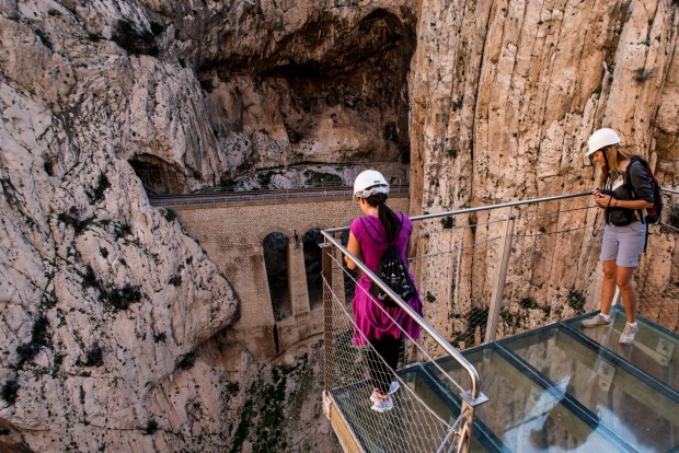 Tourists enjoy the view from the 'El Caminito del Rey' (King's Little Path) footpath on April 1, 2015 in Malaga, Spain. ...