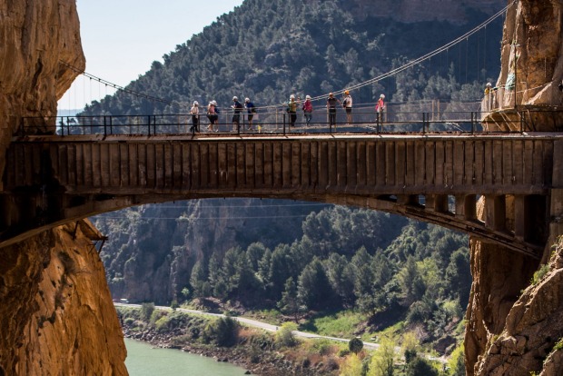 Tourists walk along the 'El Caminito del Rey' (King's Little Path) footpath in Malaga, Spain.