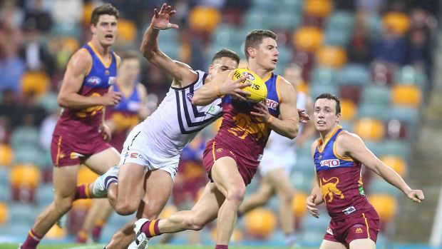 The Lions' Dayne Zorko breaks free in a star performance against Fremantle.