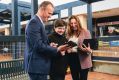 Belconnen High year 7 student, Reece Bowman, with ACT Chief Minister Andrew Barr and MLA Yvette Berry.