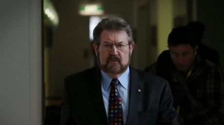 Senator Derryn Hinch uses parliamentary privilege to name 'monster' cop who raped children over 16 years.