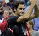 Captivating even when he doesn't win: Roger Federer leaves the court after losing to Juan Martin del Potro in the US Open.