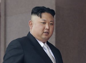 North Korean leader Kim Jong Un walks along his viewing balcony during a military parade on Saturday, April 15, 2017, in Pyongyang, North Korea to celebrate the 105th birth anniversary of Kim Il Sung, the country's late founder and grandfather of current ruler Kim Jong Un.