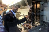 Tolga Kumova works the lamb rotisserie at Diggers and Dealers (because we just had to run this picture again).