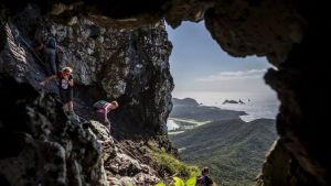 Walkers descending from Goat House Cave on Mt Lidgbird.