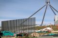 A security fence is installed across the lawns of Parliament House in Canberra on Tuesday.