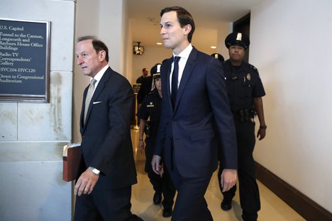 White House adviser Jared Kushner, center, and his attorney Abbe Lowell, left, arrive on Capitol Hill in Washington, Tuesday, July 25, 2017, to be interviewed behind closed doors by the House Intelligence Committee.