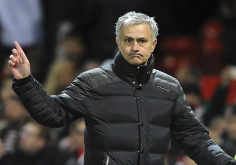 Manchester United manager Jose Mourinho waves to fans after the final whistle during the English Premier League soccer match between Manchester United and Sunderland at Old Trafford in Manchester, England, Monday, Dec. 26, 2016.