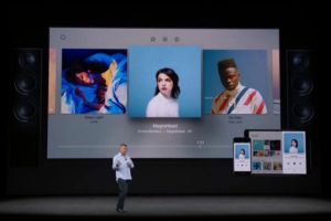 Apple senior vice president Eddy Cue stands in front of Blackery's EP cover.