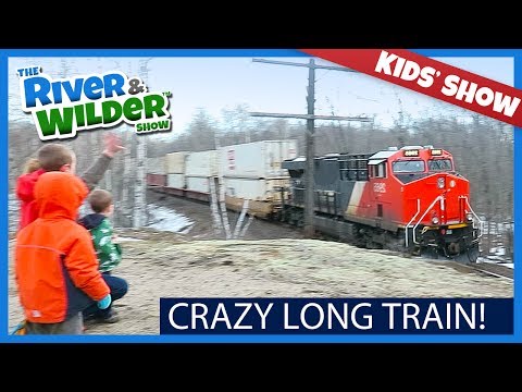 BOYS SPOT A CRAZY LONG TRAIN WITH 180 DOUBLE-STACK CARS