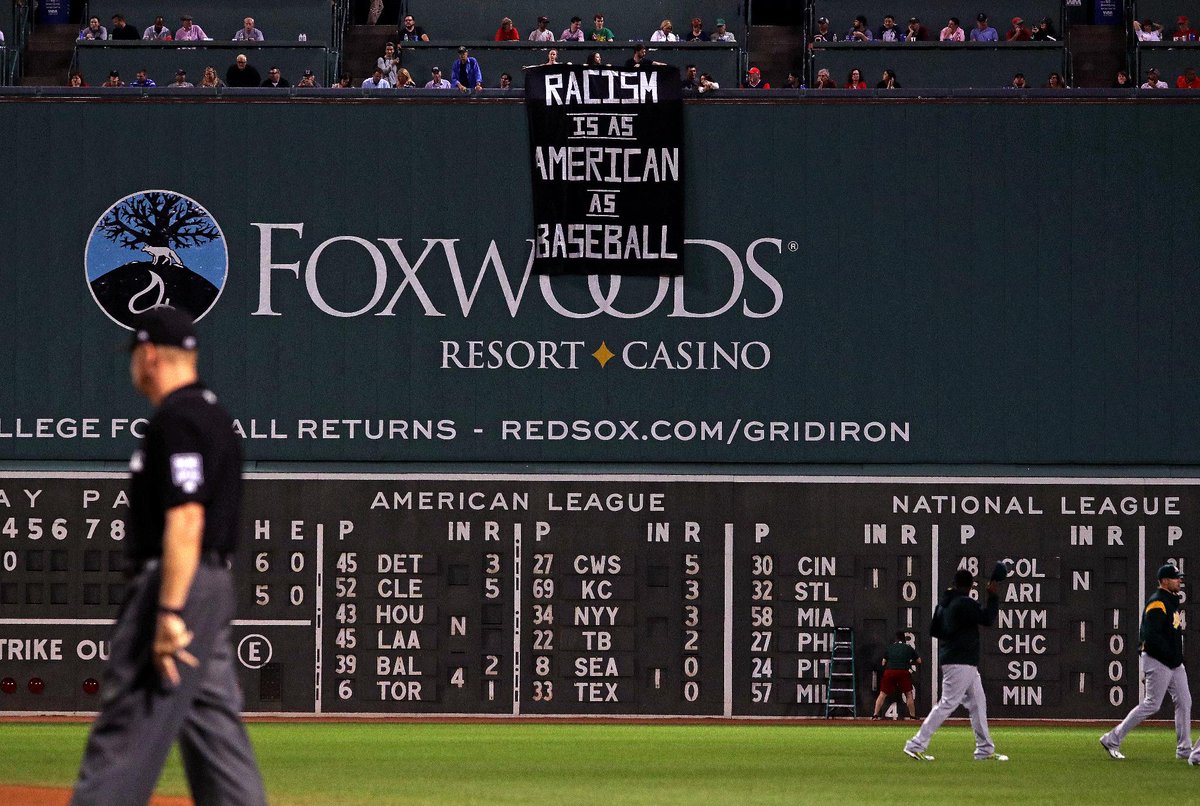 Fans denounce racism with banner above Fenway Park