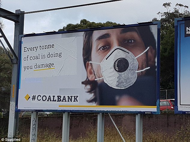 Another put a gas mask on a man with the words 'every tonne of coal is doing you damage'