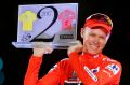 Britain's Chris Froome celebrates on podium after winning the Vuelta, having also won this year's Tour de France.