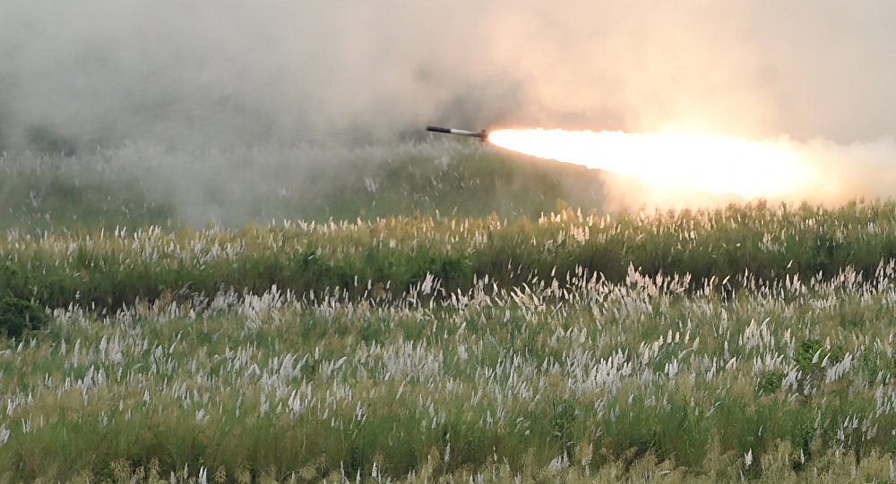 A projectile is launched by a High Mobility Artillery Rocket System (HIMARS) operated by the US Marines during a live fire exercise as part of the Philippines-US amphibious landing exercise (PHIBLEX) at Crow Valley in Capas town, Tarlac province, north of Manila. (File)