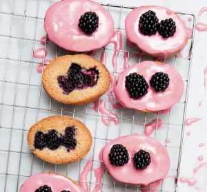 Blackberry and star anise friands with blackberry icing.