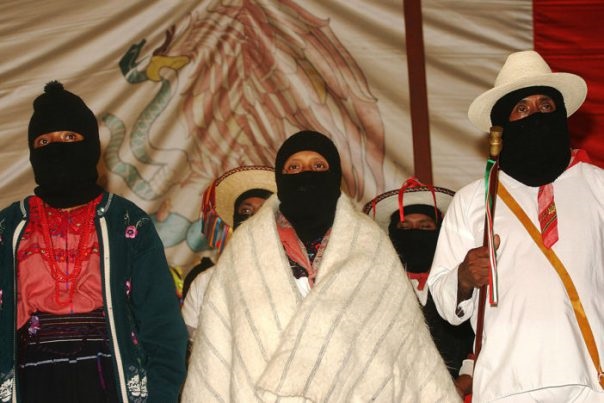 Zapatistas at anniversary celebration – Photo: Janet Schwartz