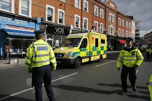 Police and an ambulance stand near Parsons Green subway station in London, Friday, Sept. 15, 2017