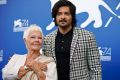 Judi Dench, and Ali Fazal pose during a photo call for the film Victoria And Abdul at the 74th Venice Film Festival in ...