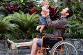 The world's first patient to receive a 3D-printed tibia transplant, Reuben Lichter, with his son, William.