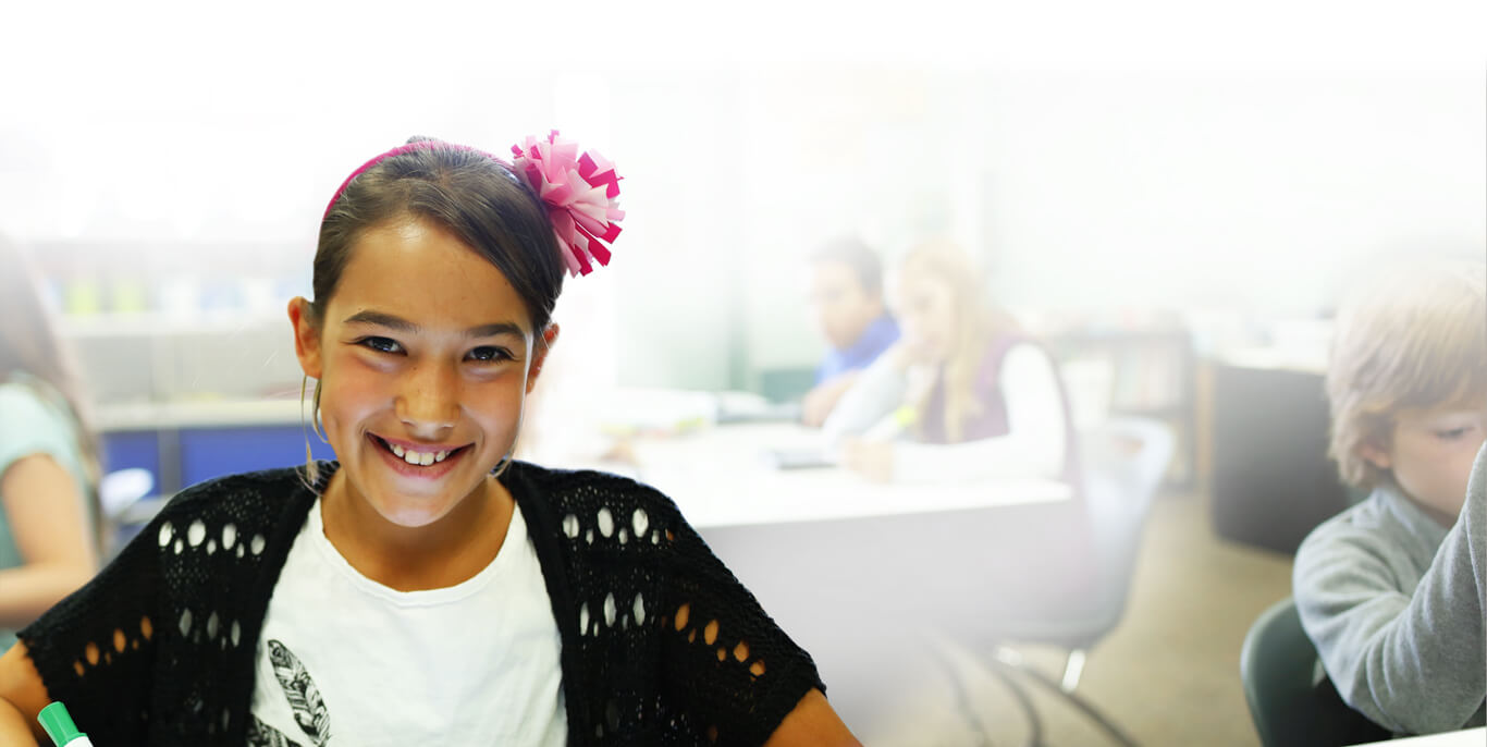 Girl learning math in classroom