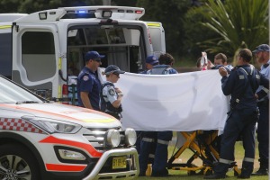 The toddler is treated by emergency services before being taken to hospital.