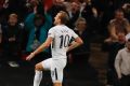 Tottenham's Harry Kane celebrates after scoring his side third goal.