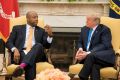 US President Donald Trump speaks to Senator Tim Scott in a White House meeting on September 13, 2017.