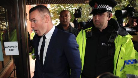 Sideline spell: Wayne Rooney has been handed a 2-year driving ban after pleading guilty to drunk driving.