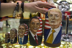 Traditional Russian wooden dolls called Matreska depict US presidents, from left, George H.W. Bush, Bill Clinton, George W. Bush, Barack Obama and US presidential candidate Donald Trump displayed in a shop in Moscow, Russia on Tuesday, Nov. 8, 2016.