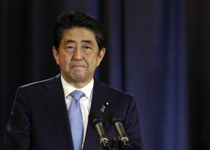 Japanese Prime Minister Shinzo Abe talks during a press conference in Buenos Aires, Argentina, Monday, Nov. 21, 2016.