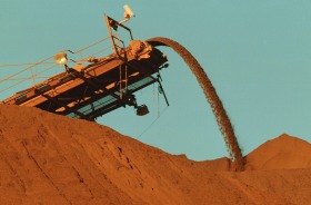 Strong iron ore prices could add billions to federal coffers, but the gains may be counter-acted by the high Australian ...