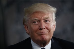 President Donald Trump listens as he is introduced by Israeli Prime Minister Benjamin Netanyahu at the Israel Museum, Tuesday, May 23, 2017, in Jerusalem.