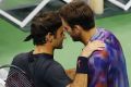 Federer congratulates del Potro.