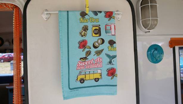 Kiwiana tea towels add a touch of a bygone era to the caravan.