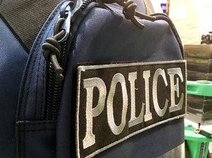 Police backpack on display at a gun show. Taken on July 2017.