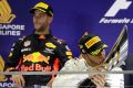 Mercedes driver Lewis Hamilton kisses his trophy after winning the Singapore Formula One Grand Prix with Red Bull driver ...