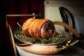 La Rosa's spit-roasted Golden Plains pig is boned and rolled into porchetta.