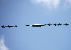 A B-2 Stealth Bomber assigned to Whiteman Air Force Base (AFB), Mo. leads an aerial flight formation during Exercise Valiant Shield 2006.