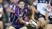 Billy Slater gets ready to pass the ball during a game.