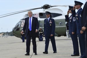 President Donald Trump walks toward Air Force One at Andrews Air Force Base in Md., Tuesday, Sept. 26, 2017, where he is heading to New York. Trump will meet with major GOP donors for a private dinner in New York.