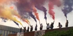 Image credit @sistersuncut, flares on the roof of Holloway Prison