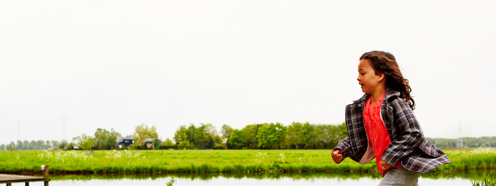 Young girl running in a field