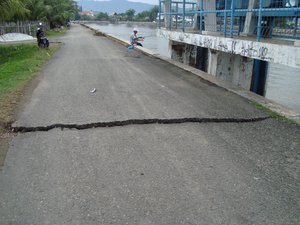 An asphalt road in Padang, West Sumatra, which is cracked after an earthquake rocked on 30 September 2009