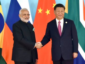 The Prime Minister, Shri Narendra Modi being welcomed by the President of the People's Republic of China, Mr. Xi Jinping, at the 9th BRICS summit, in Xiamen, China