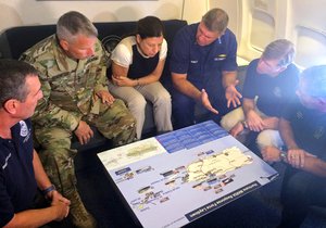 Homeland security interim secretary Elaine Duke is briefed on hurricane Maria response during a flight to Puerto Rico on Friday September 29, 2017.