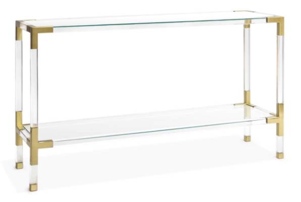 This lucite and brass console by Jonathan Adler is a piece of art in itself.